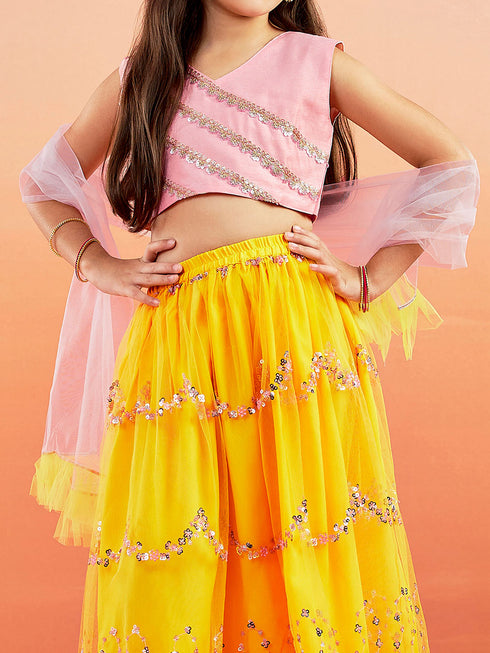 Girl's' Pink Crop Top And Yellow Net Lehenga With Ruffled Dupatta Set