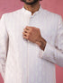 Men's Off-White Silk-Blend Ethnic Motiff Thigh Length Indo Western Set with Wide Leg Pant