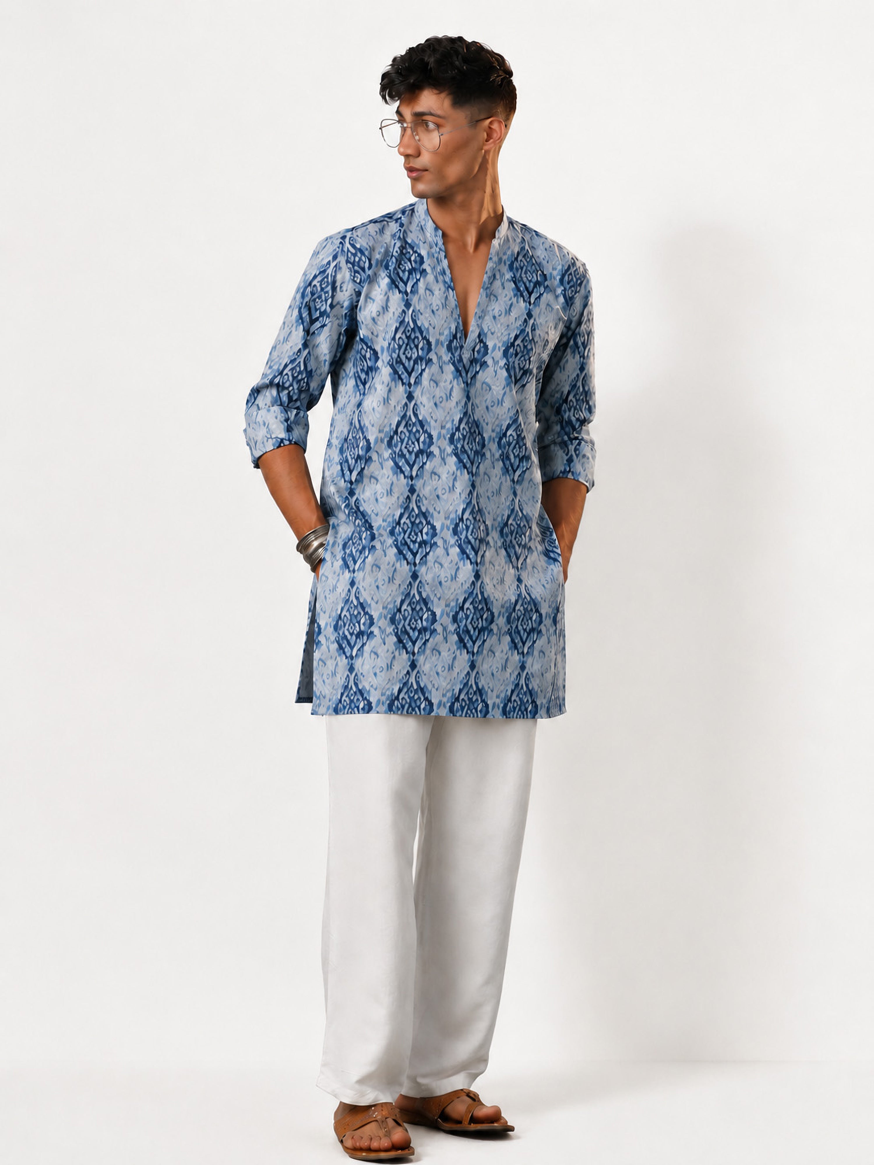 Vastramay Men Blue Ikkat Print Cotton V-Neck Kurta with White Wide-Leg Pant Set