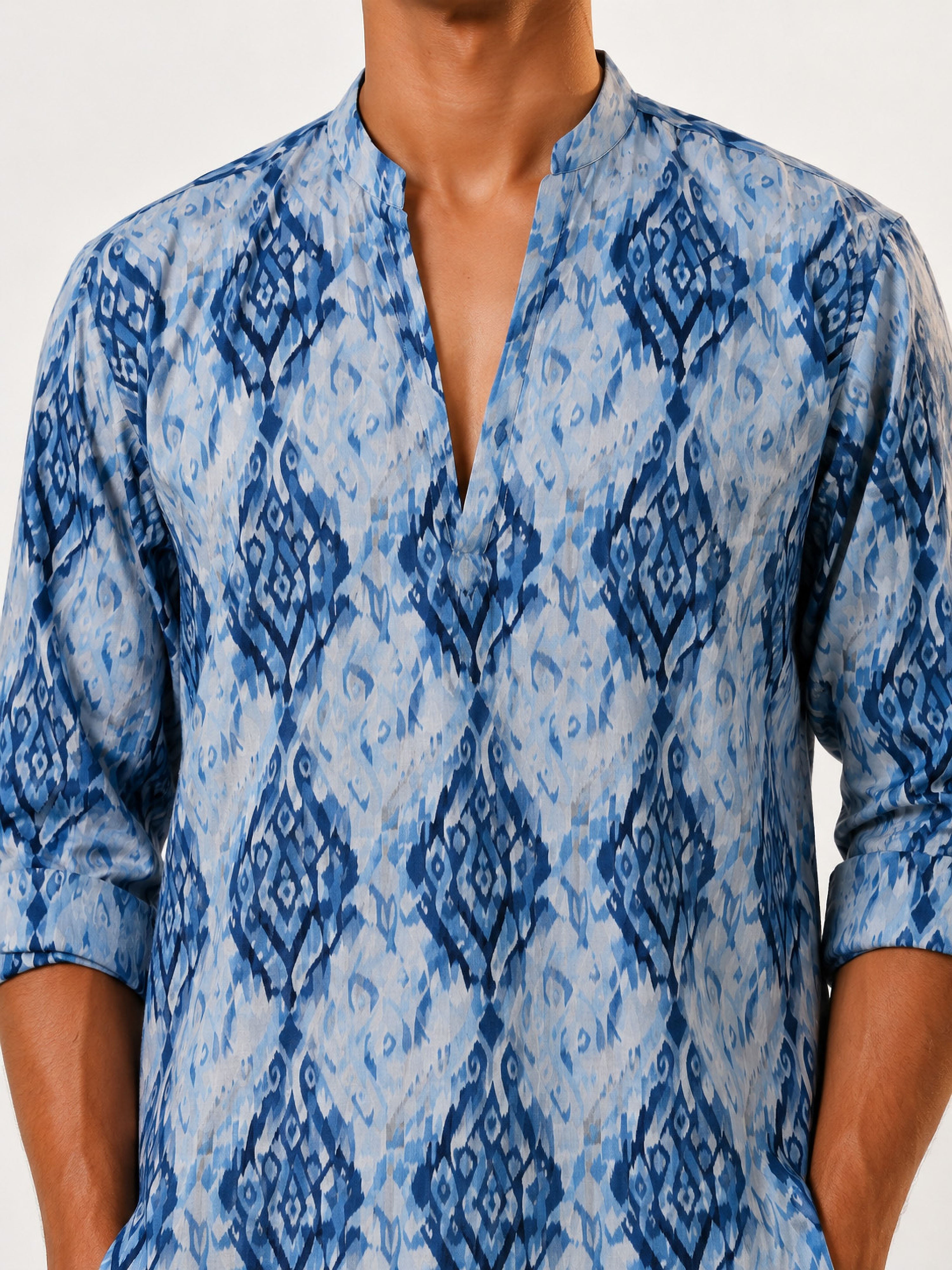 Vastramay Men Blue Ikkat Print Cotton V-Neck Kurta with White Wide-Leg Pant Set