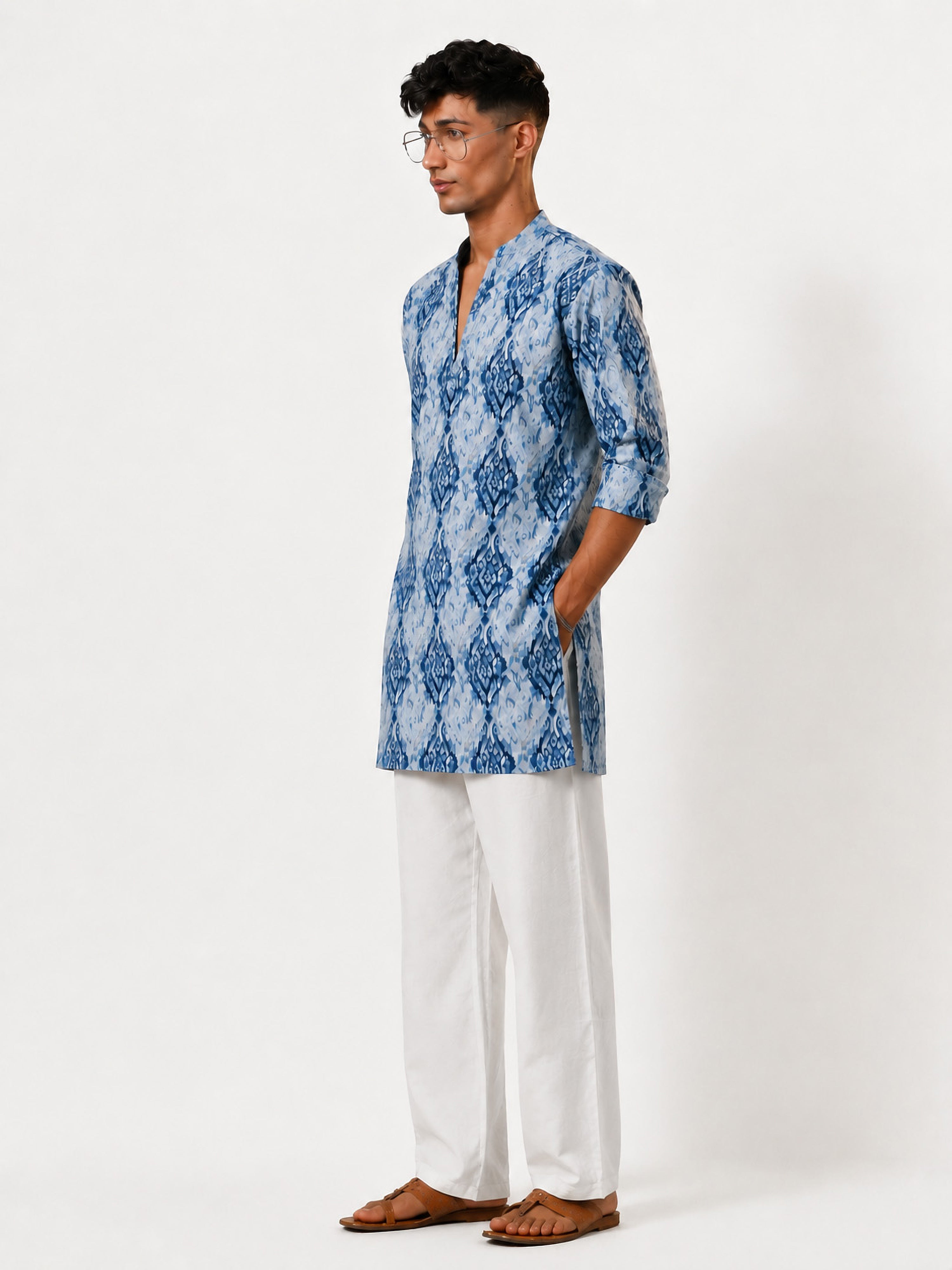 Vastramay Men Blue Ikkat Print Cotton V-Neck Kurta with White Wide-Leg Pant Set