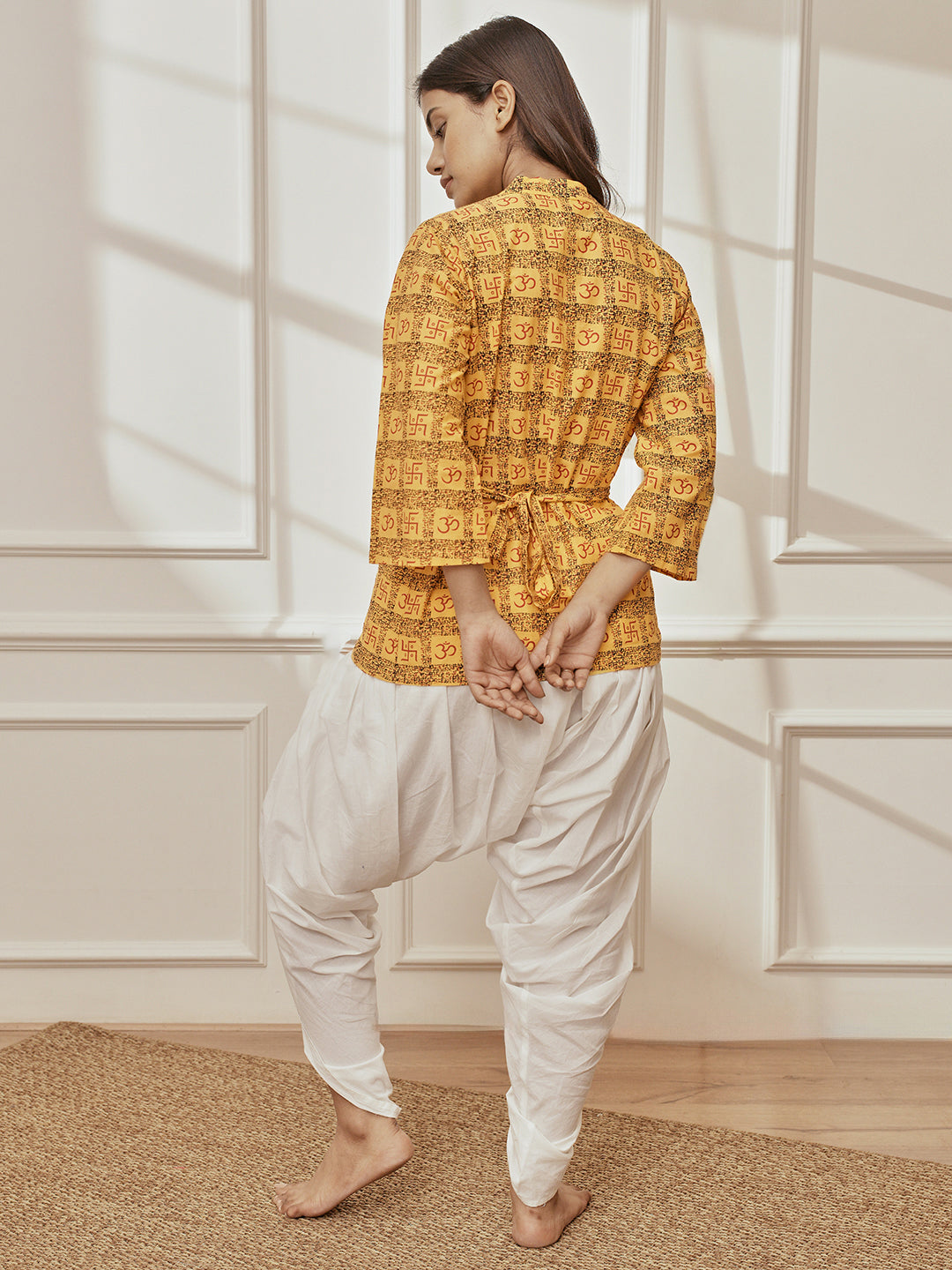 Women Yellow Printed Wrap Top with White Dhoti Pant