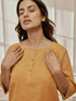 Women's Dusty Saffron Linen Cotton Kurta With White Cambric Dhoti Pants Yoga Set