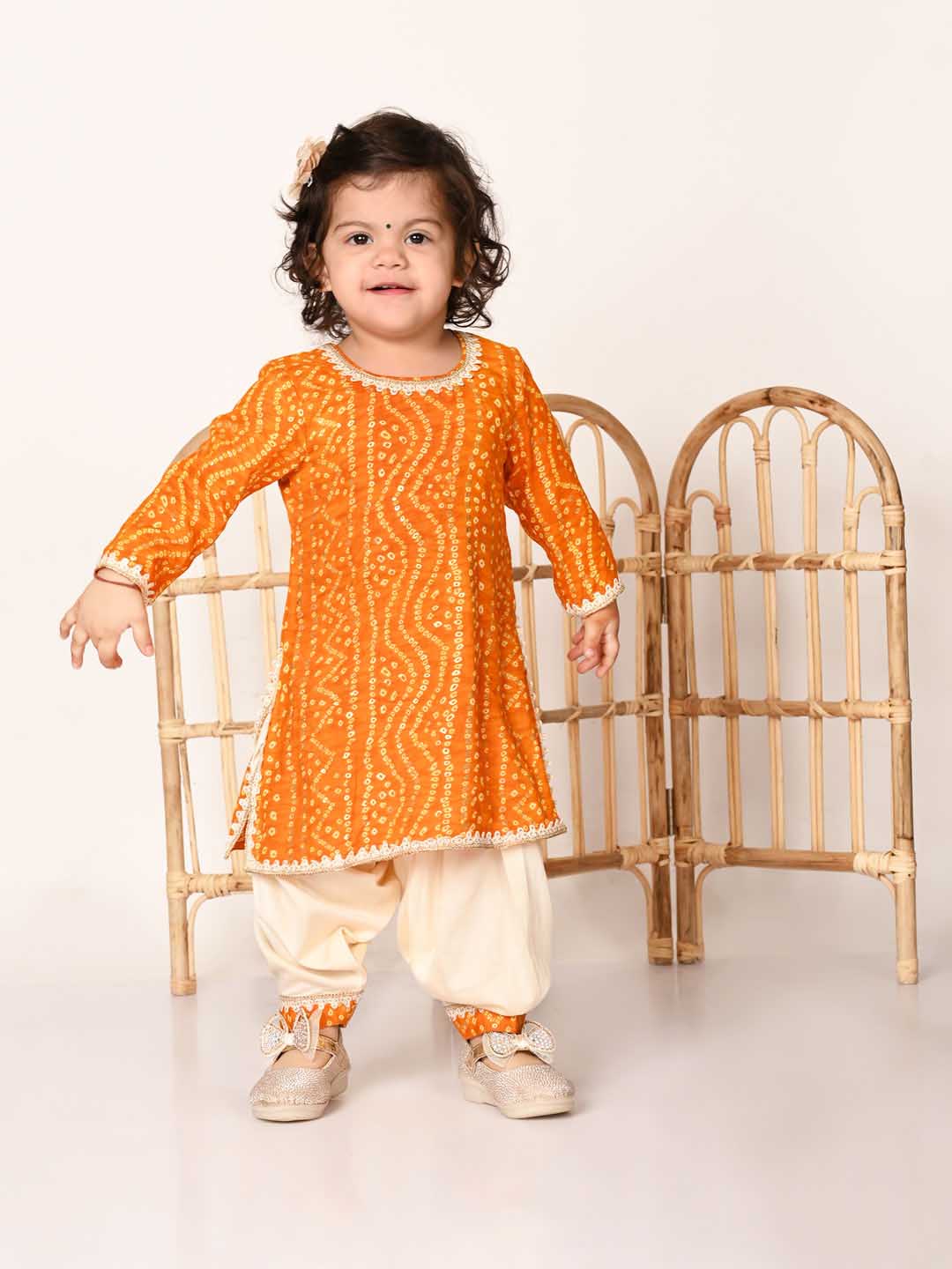 Girl's Yellow Bandhni Print Kurta And Patiala Set