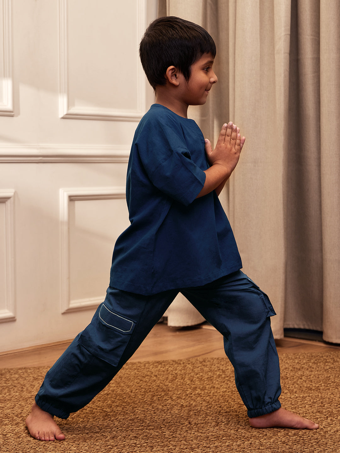 Boy's Navy Blue Solid Cotton Yoga Kurta Set With Cargo Pants