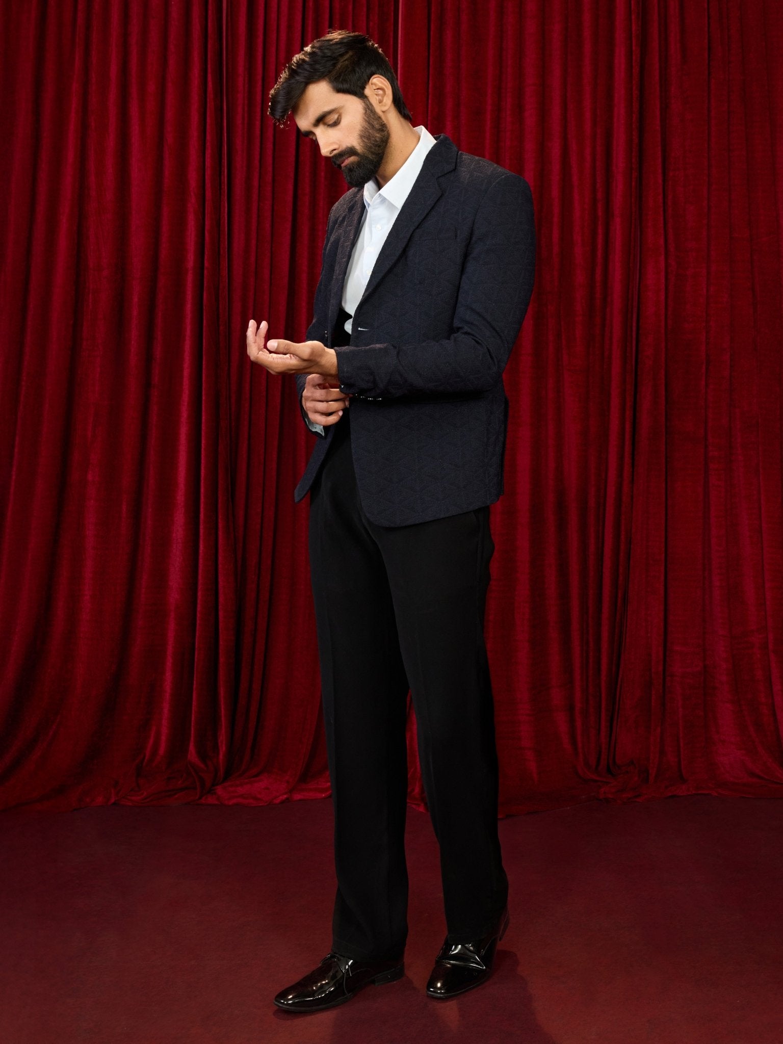 vastramayMen's Navy Blue Embossed Bafta Blazer & Black Straight Pant Co - ord Set