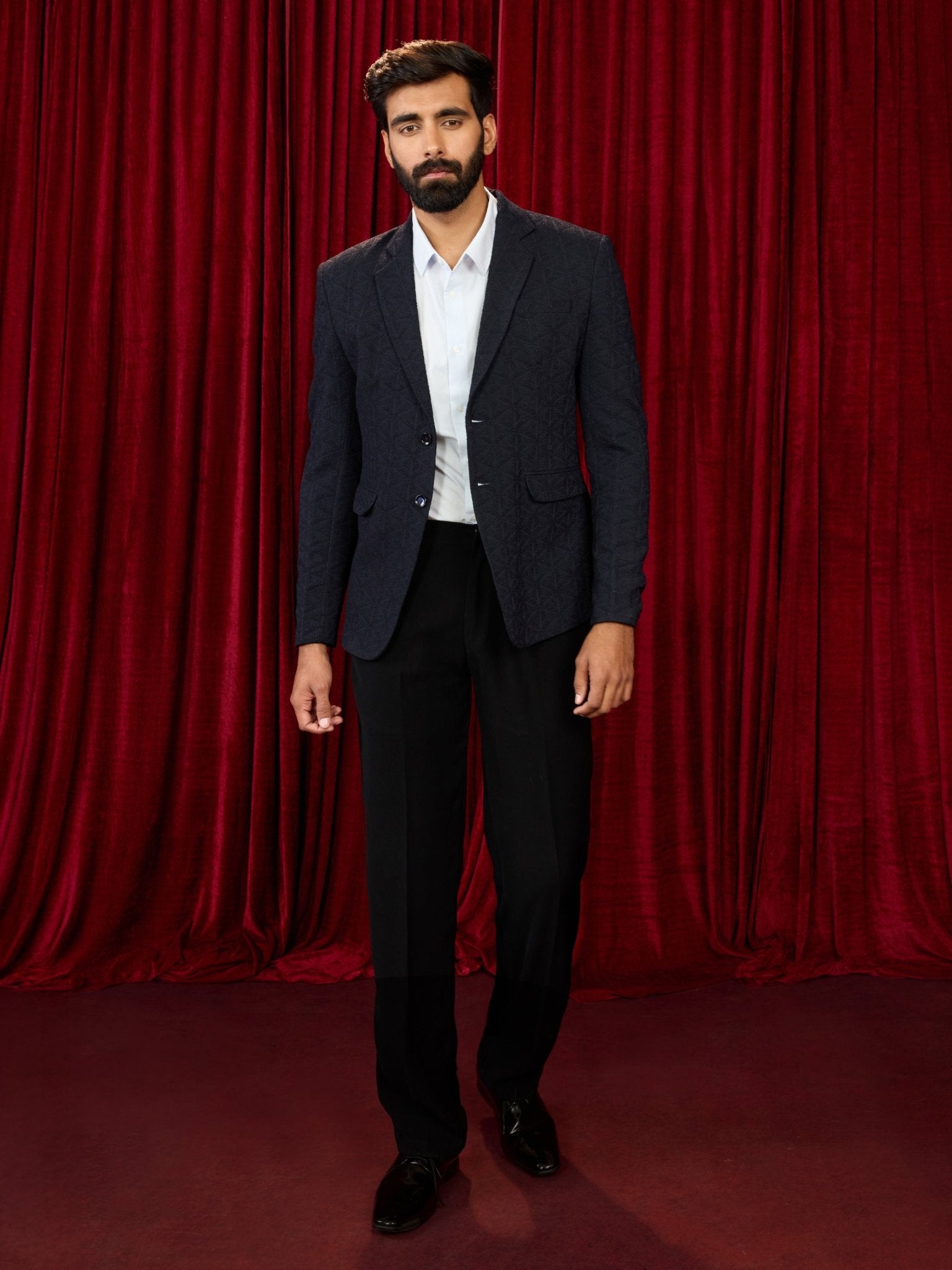 vastramayMen's Navy Blue Embossed Bafta Blazer & Black Straight Pant Co - ord Set