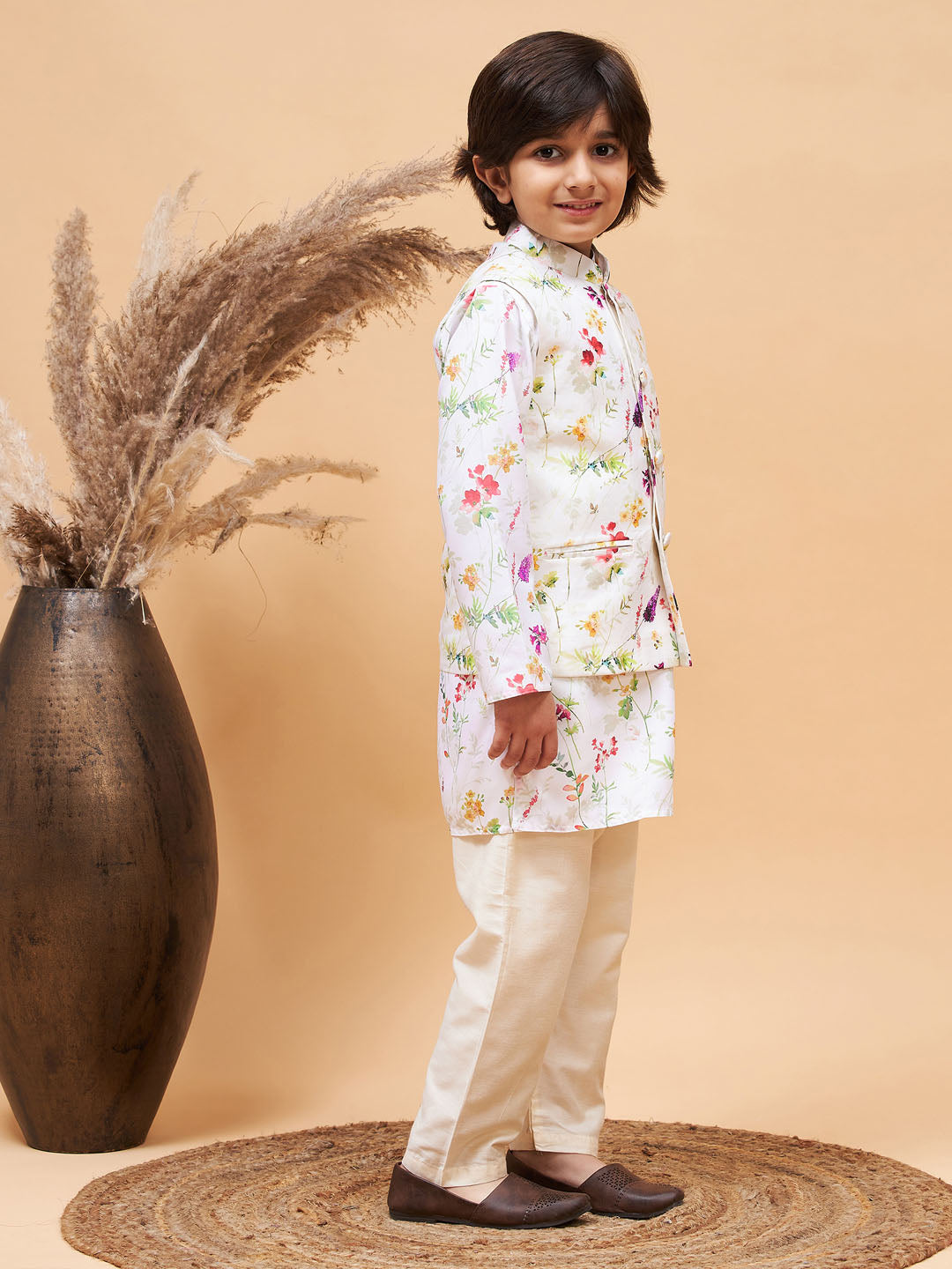 Cream Printed Nehru Jacket And Multicolor-Base Printed Kurta With Cream Pyjama Set