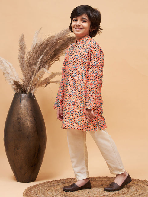 Boy's Orange Printed Kurta And Cream Pyjama Set