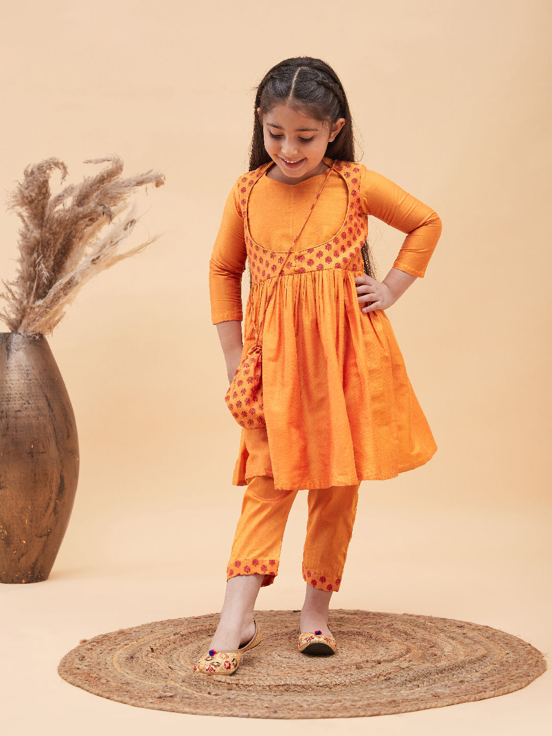 Girl's Orange Anarkali Kurta Pyjama Set With Potli Bag