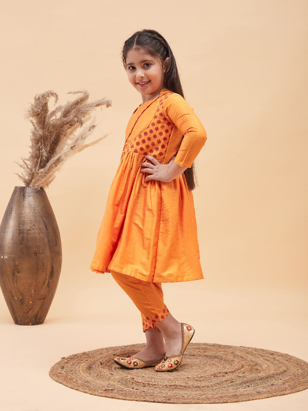 Girl's Orange Anarkali Kurta Pyjama Set With Potli Bag