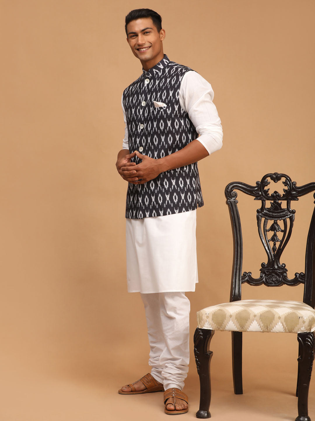 Men's Black Ikkat Printed Cotton Nehru Jacket With White Kurta And Pyjama Set