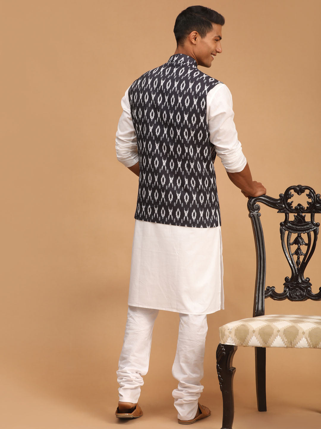 Men's Black Ikkat Printed Cotton Nehru Jacket With White Kurta And Pyjama Set