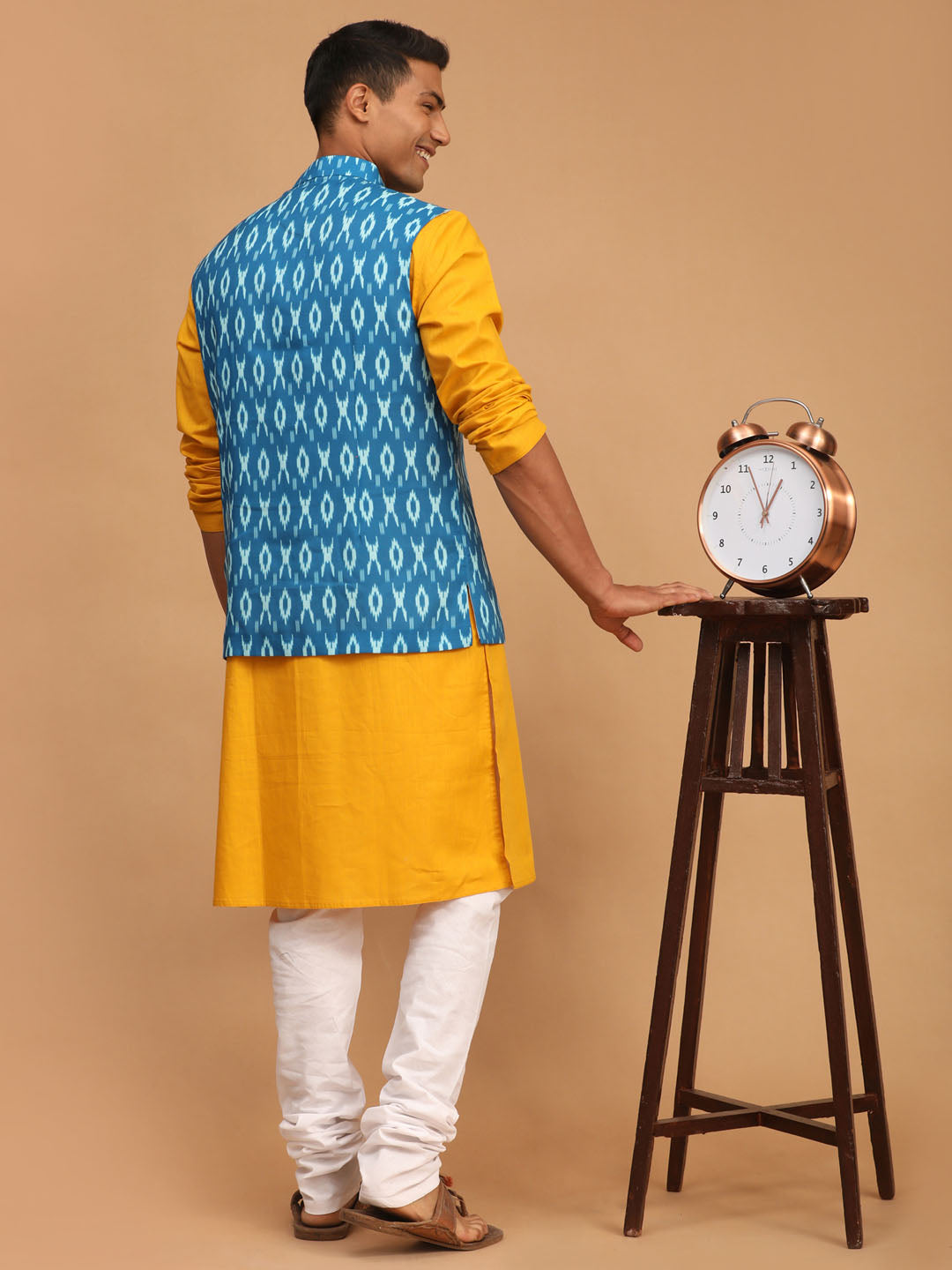 Men's Turquoise Ikkat Printed Cotton Nehru Jacket With Mustard Kurta And White Pyjama Set