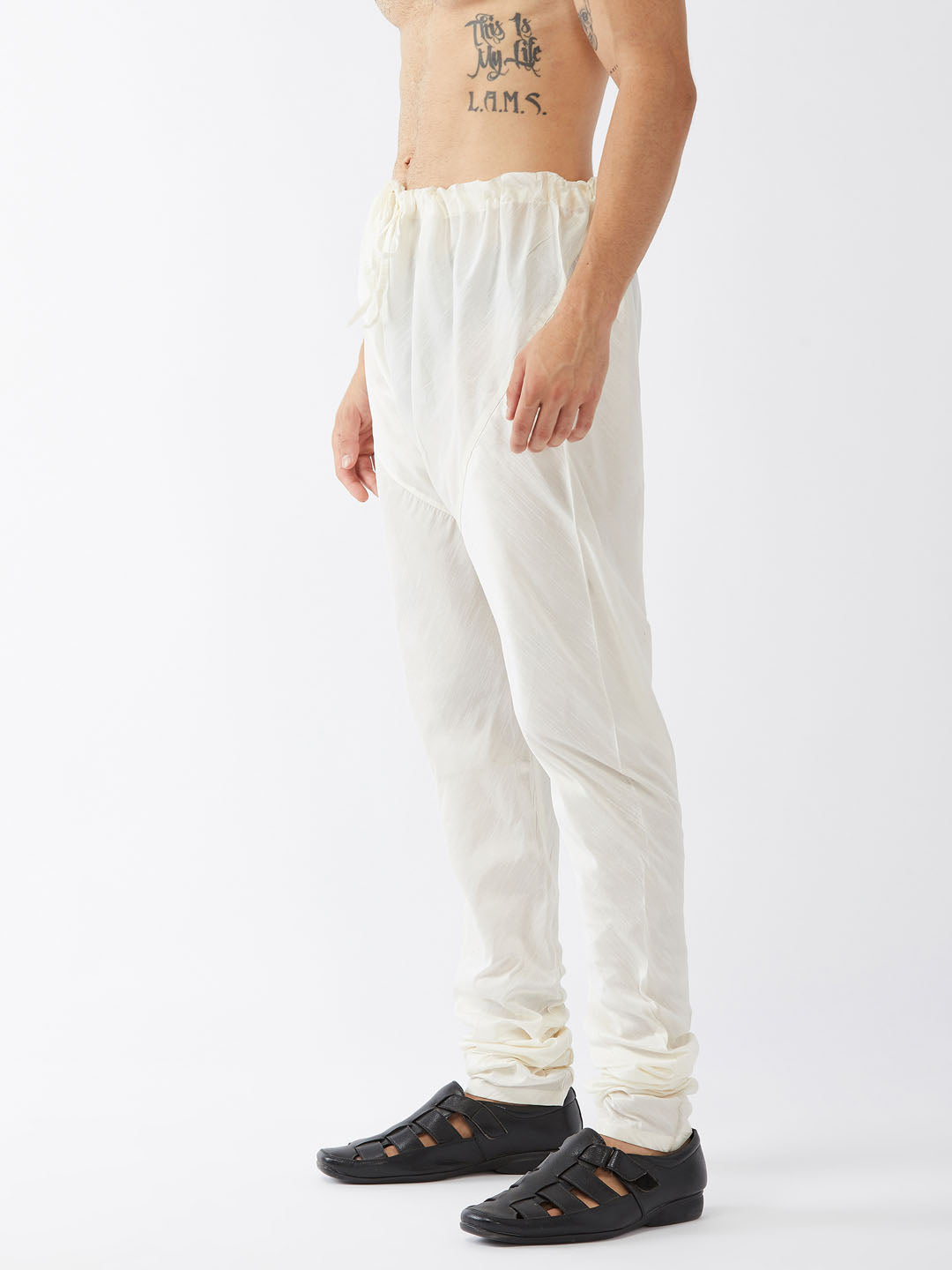 VASTRAMAY Men's Cream Solid Relax Fit Churidar