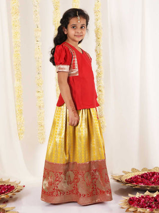 Vastramay Girl's Yellow And Maroon Pavda Pattu Lehenga Choli Set