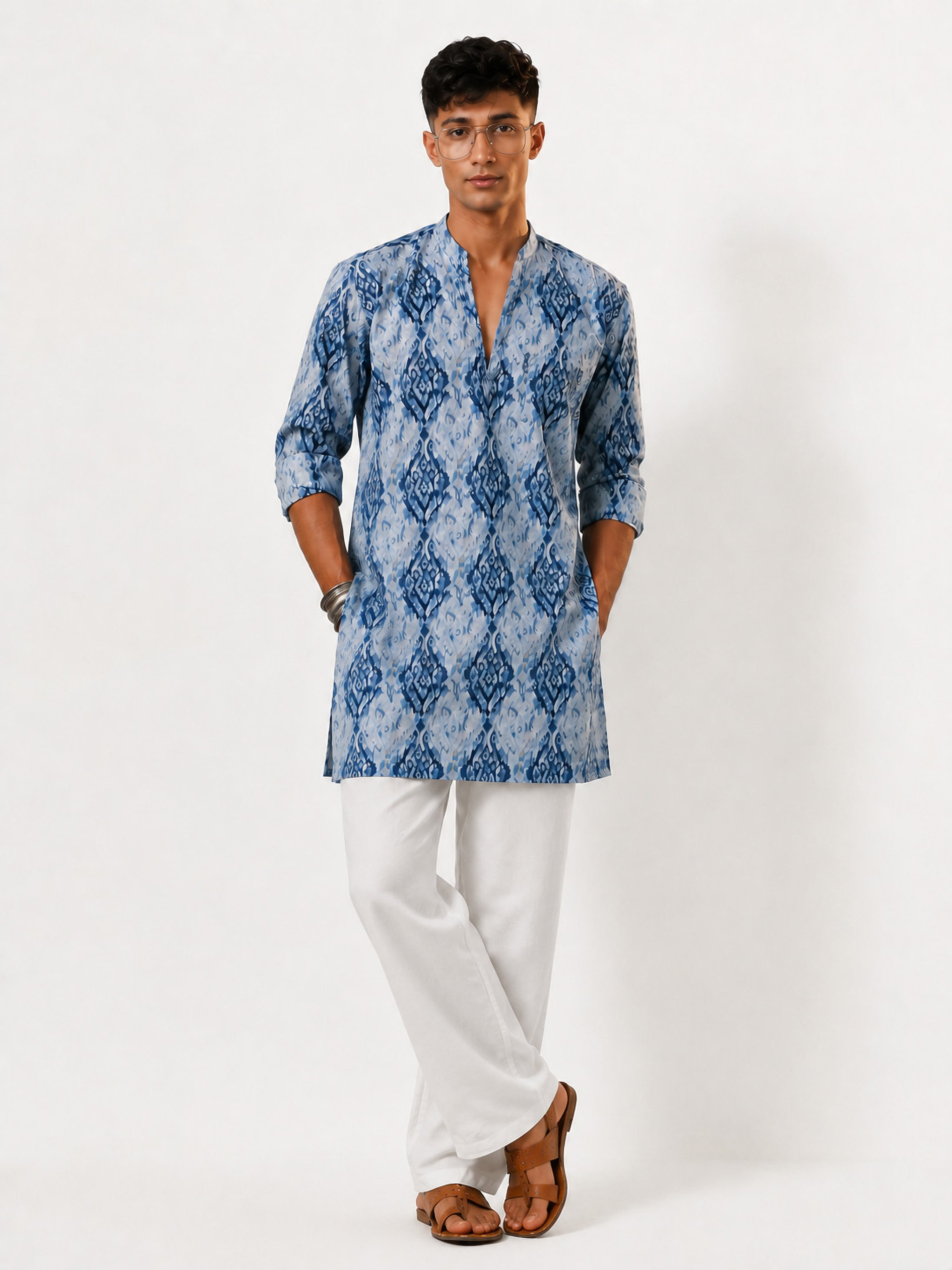 Vastramay Men Blue Ikkat Print Cotton V-Neck Kurta with White Wide-Leg Pant Set