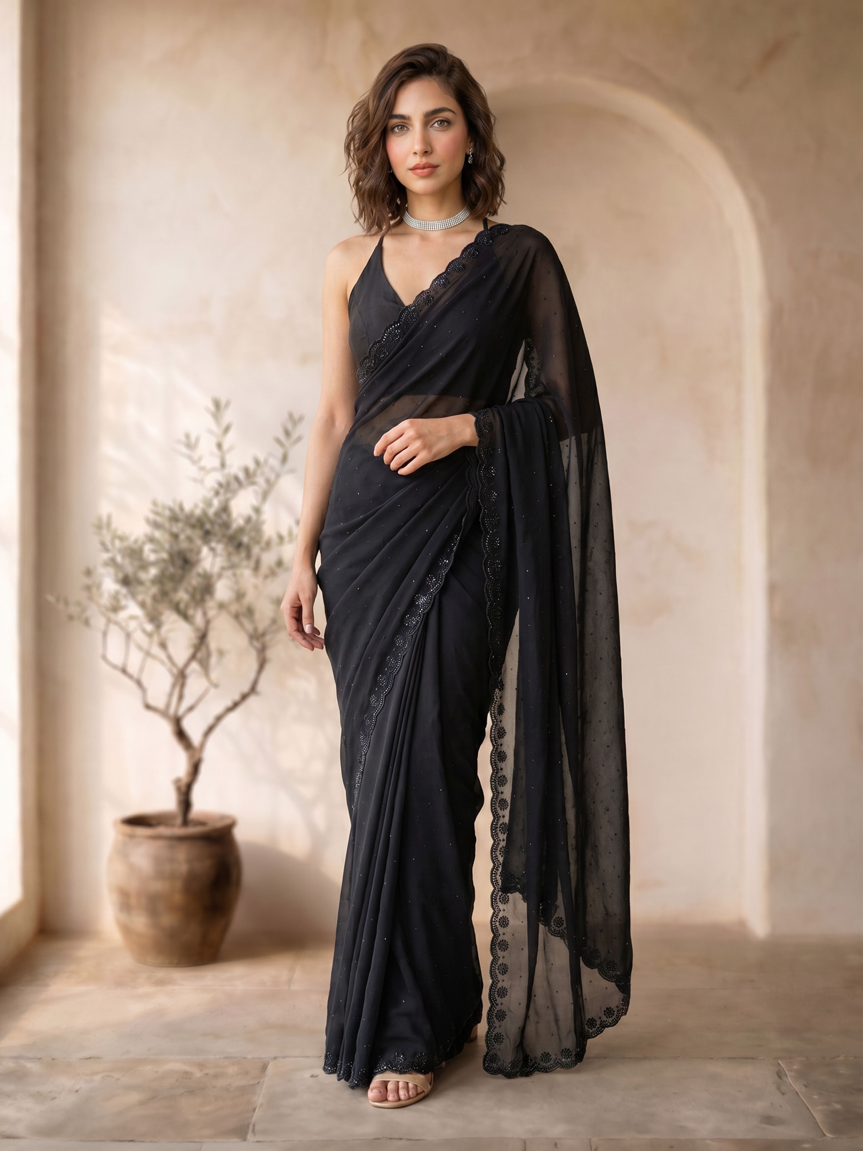 Women's Black Georgette Hem Design Saree With Unstitched Blouse Piece