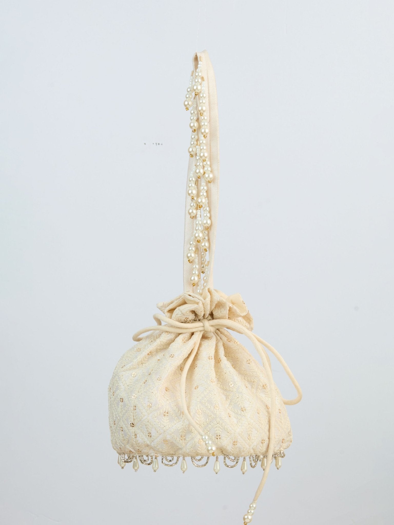 vastramayWomen's Cream Handcrafted Potli Clutch