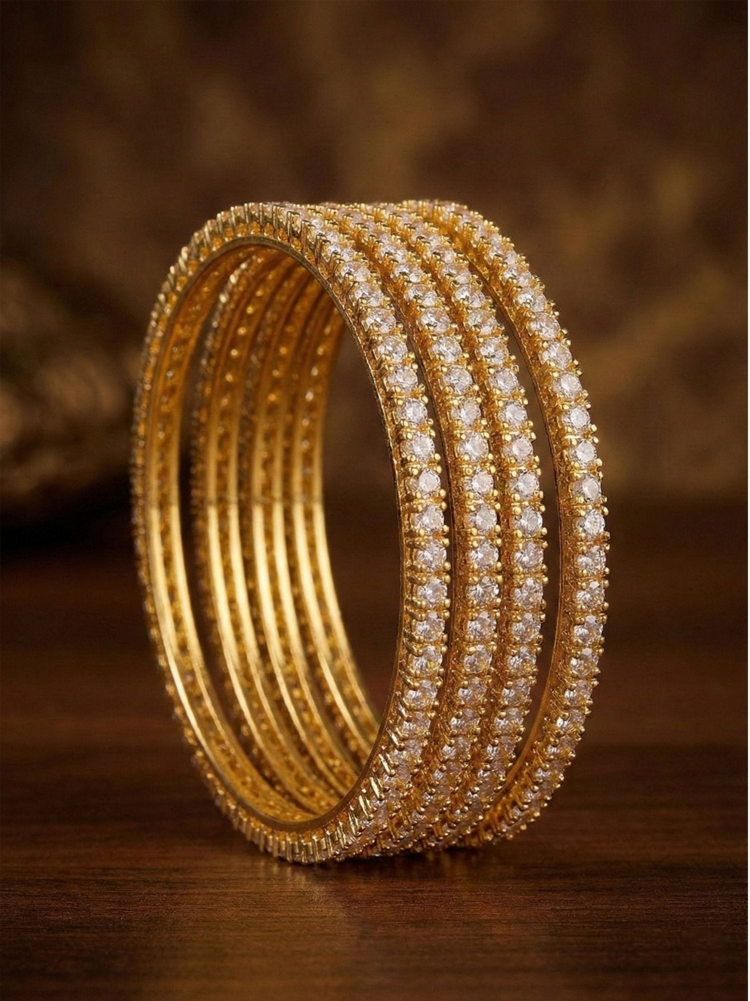vastramayWomen's Gold Rhodium Plated Bangles Set of 4