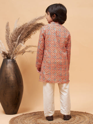 VASTRAMAY Boy's Orange Printed Kurta And Cream Pyjama Set